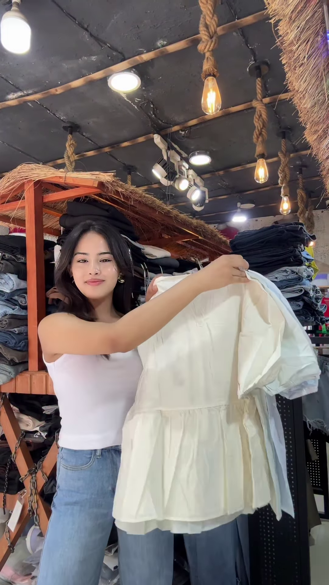 White Floral Embroidered Blouse with Light Blue Jeans – Casual Boutique Look for Women - Image 2