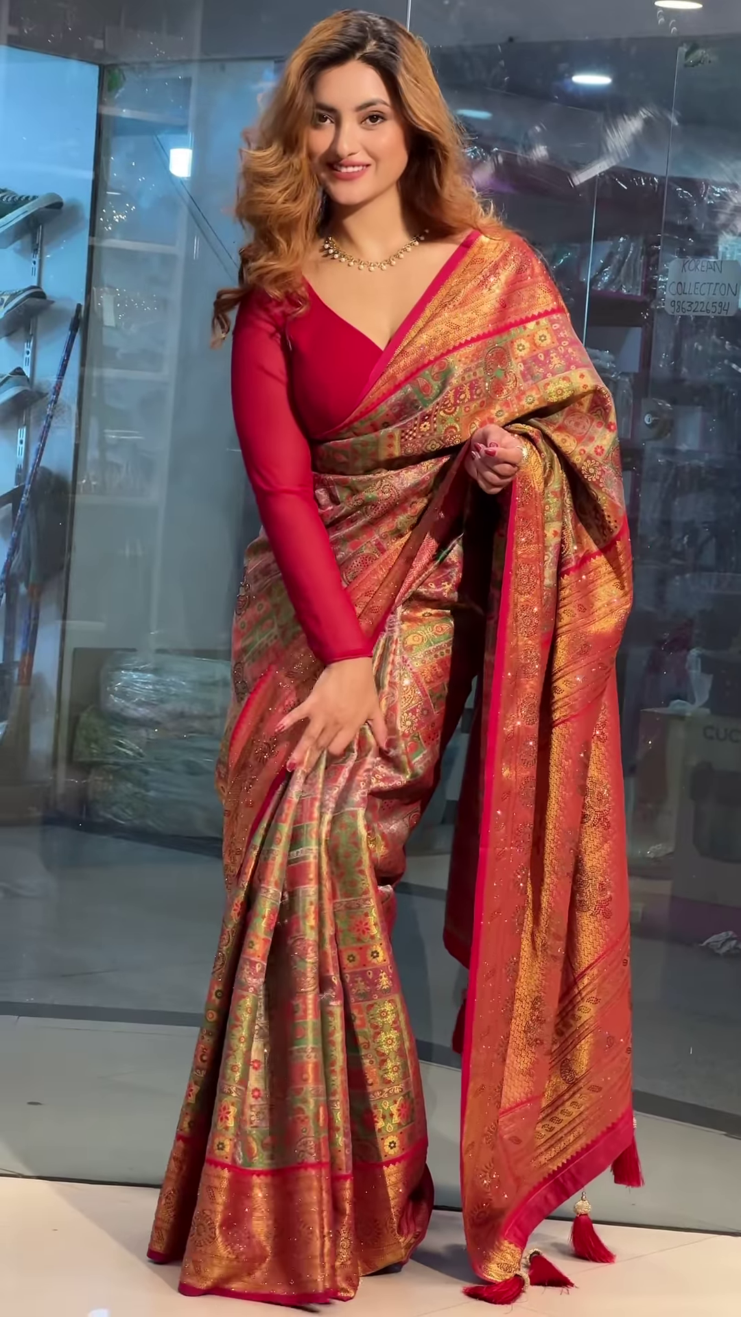 Vibrant Crimson Red Multi-Patterned Saree with Intricate Gold Zari and Geometric Motifs