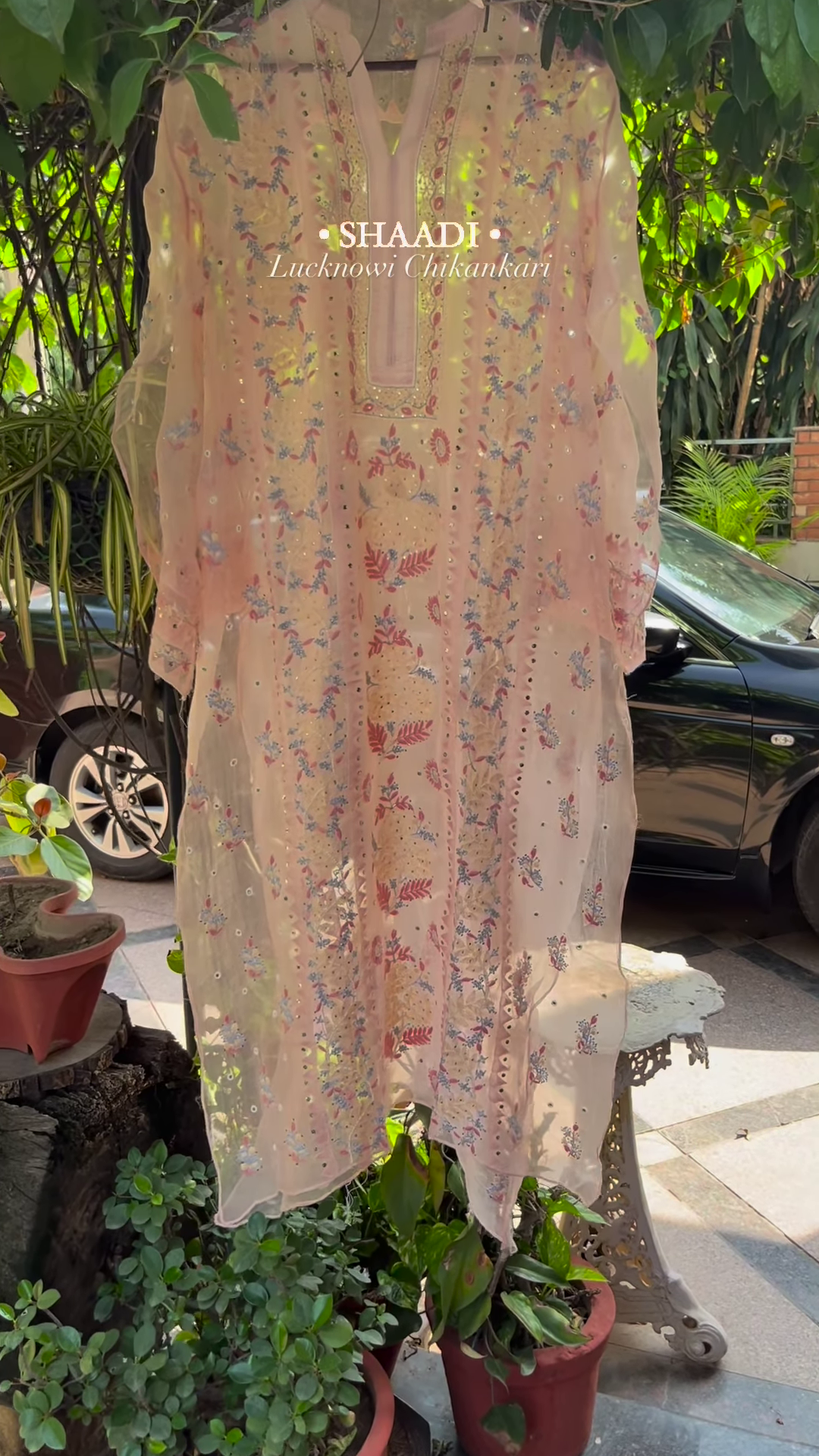 Peach Organza Lucknowi Chikankari Kurta with Hand-Embroidered Floral Motifs and Sequin Accents