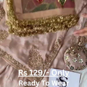 Rose Gold Splendor: Embroidered Silk Suit with Potli Bag